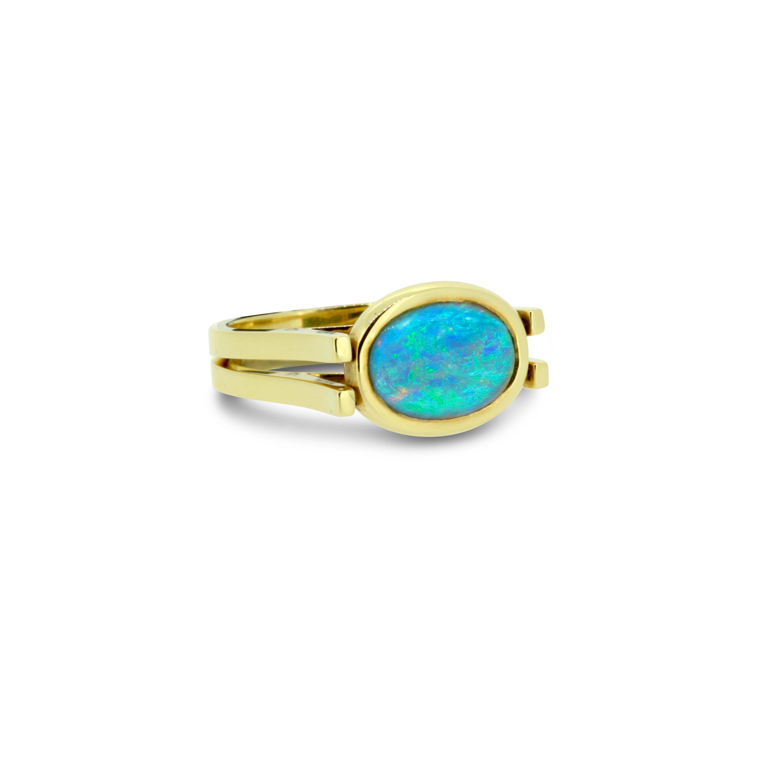 Double Sided Black Opal Ring set in 18k Yellow Gold featuring Soothing Blue Colours